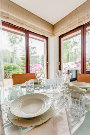Elegant and stylish porcelain table setting for dinner