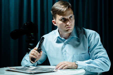 Photo of armed man with psychosis of killingの写真素材