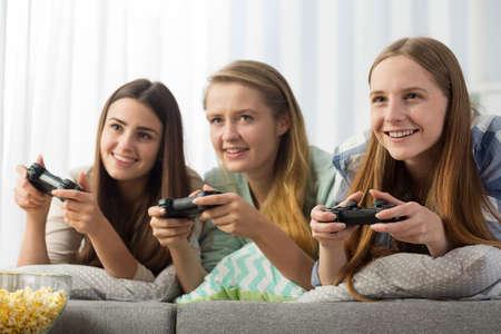 Three girl play on gameの写真素材