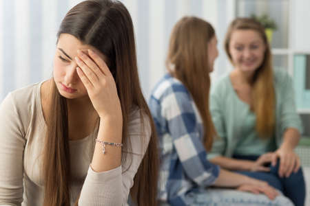 Image of discriminated teenage girl with problems