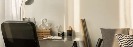 Space for working in cozy and modern bedroom