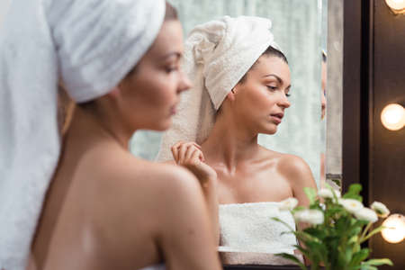 Horizontal view of a handsome female having relax in spaの写真素材