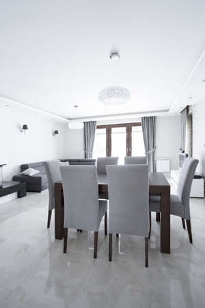 Dining table set in luxury gray interiorの写真素材