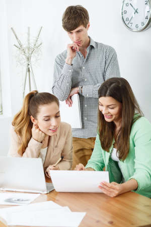 Photo of young creative people working in studioの写真素材