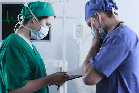 View of doctors being hesitant to run a specific surgeryの写真素材