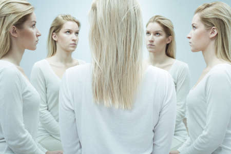 Young woman with mental disease with alter egoの写真素材