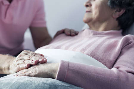 Image of marital love and support between senior couple