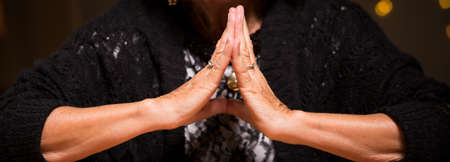 Old woman is professional and experienced fortune tellerの写真素材