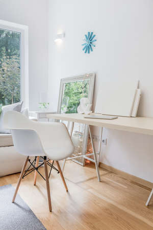 Image of new home office interior with white furnitureの写真素材