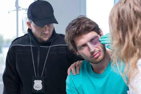 Horizontal view of young criminal in hospital