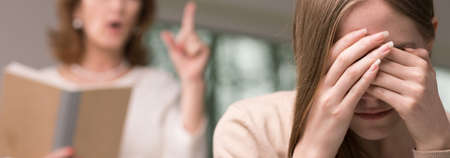 Panorama of dispute between mother and stressed daughterの写真素材