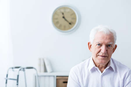 Photo of senior man wtih disability at home