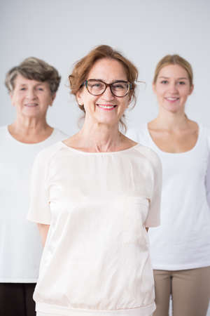 Image of mature female with daughter and motherの写真素材