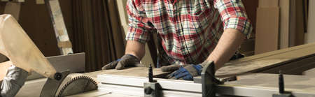 Close up of carpenter during work, panorama.