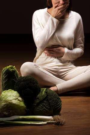 Disgusted teenager on diet and healthy foodの写真素材