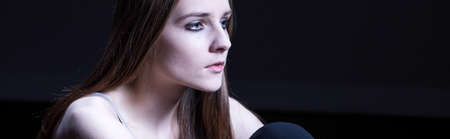 Young teen is unhappy in her lifeの写真素材