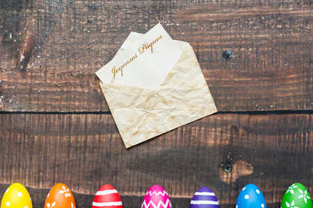 Shot of colorful Easter eggs and greetings in Frenchの写真素材
