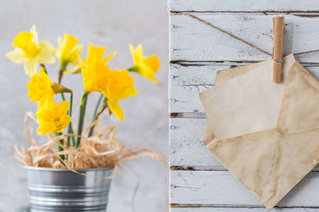 Shot of a bunch of daffodils and an envelopeの写真素材