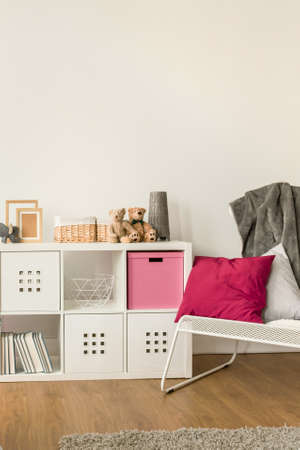 Photo of modern children's room with wooden floorの写真素材