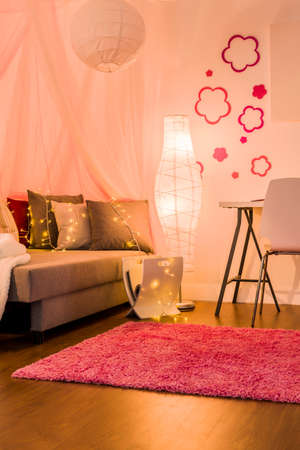 Modern design of stylish bedroom with wooden floorの写真素材