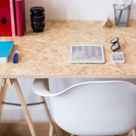 Close up of new eco style simple wooden deskの写真素材
