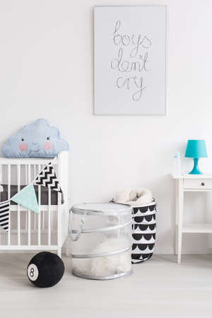 Shot of a black and white baby room with blue accessoriesの写真素材