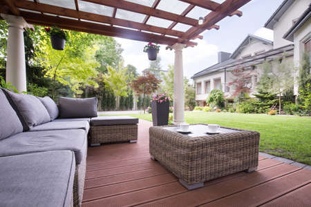 Cozy wicker couch on the terrace