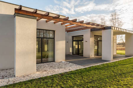 Photo of new up-to-date house from the outsideの写真素材