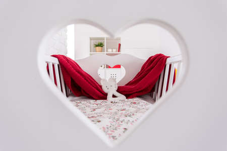 Shot of a crib in a modern baby roomの写真素材