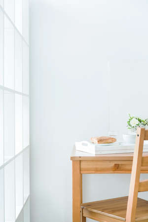 Light interior with wood chair and tableの写真素材