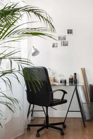 Light study area with big armchair.