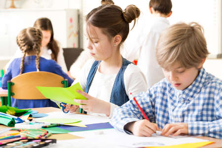 Shot of little children during art classの写真素材