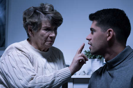 Shot of a grandmother and her grandson talking