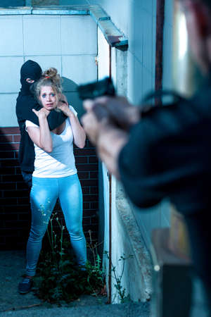 Violence scene of kidnapping young frightened girlの写真素材