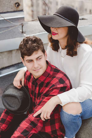 Young hipster couple in love in the cityの写真素材