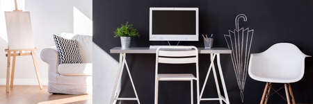 New design flat with white, light furniture and decorative blackboard wallの写真素材