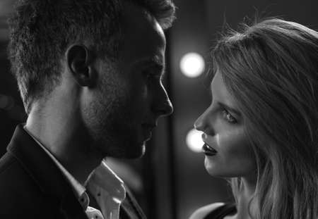 Passionate sexy couple looking in the eyes