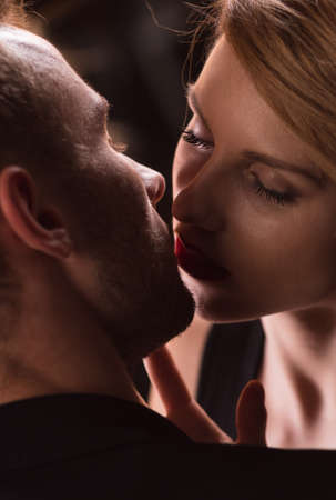 Close-up of passionate couple kissing in the lipsの写真素材