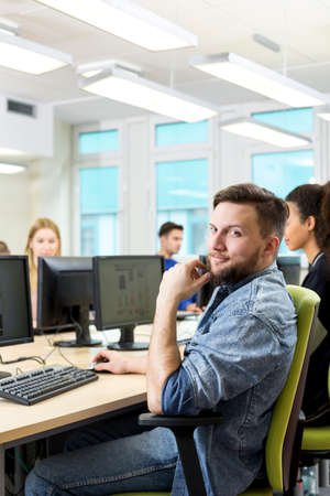 Shot of a young IT student looking at the camera