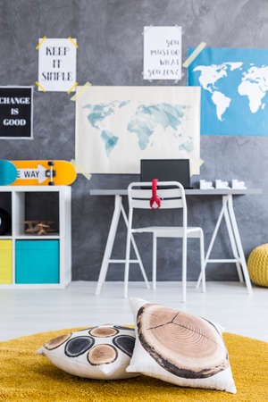 Shot of a kids' room interior with many posters on the wallの写真素材