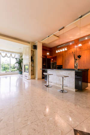 Very spacious ground floor of a detached house, with dark kitchen and marble floor