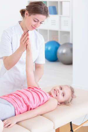 Private physiotherapy and rehabilitation clinic- pediatric physiotherapy sessionの写真素材