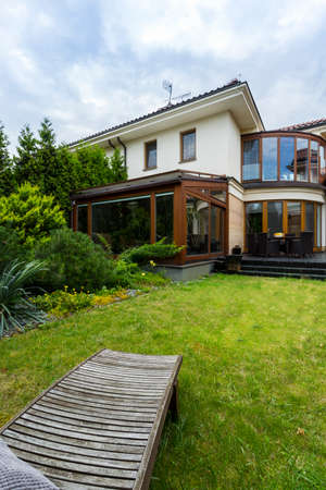 Shot of a backyard and a garden of a modern detached house