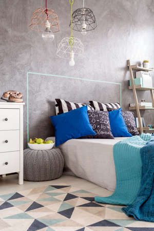 New design bedroom with pattern carpet, large bed and decorative wall plaster
