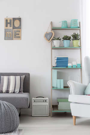 Trendy scandinavian wooden rack and ecological inspiring decorationsの写真素材