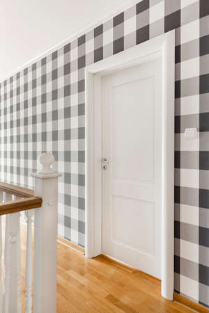 Trendy black and white checkered hallway interior designの写真素材