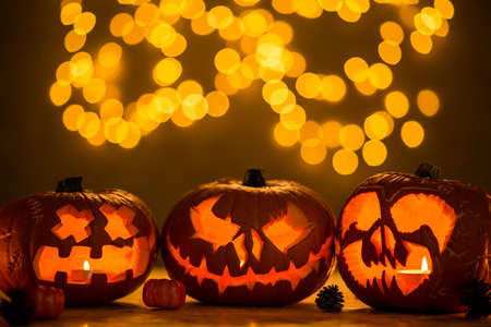 Three spooky jack-o'-lanterns made for halloweenの写真素材