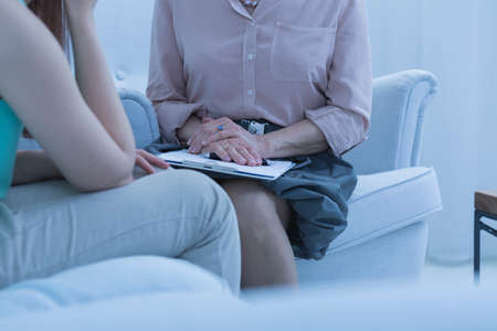 Session of the female patient and female doctor  in the doctor's officeの写真素材