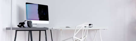 Panoramic view of a new design white home office with crystal chair and desk
