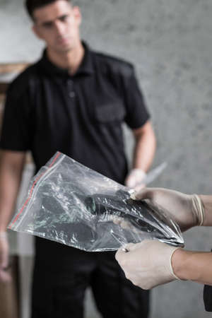 Close-up of a secured crime scene evidence in a plastic bagの写真素材